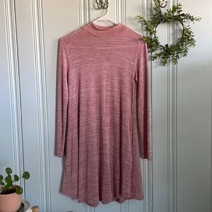 Small pink dress, worn only once. Great condition. Unsure of brand.